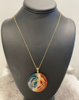 Necklace with NWAC logo engraving